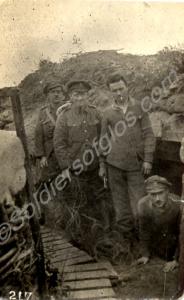 Four soldiers in a trench, unit unknown.  c.1915-1