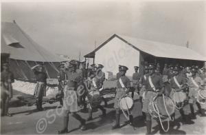Corps of Drums marching through camp at Sidi Bishr