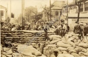 Building sandbag barricade. 2nd Battalion, The Glo