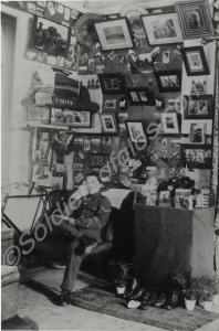 L/Cpl. G. Cryer sitting in barrack room.  c.1908-1