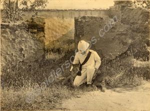2nd Lieutenant H. Whylock and his pet leopards.  2