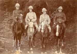 Four soldiers mounted on ponies and a mule. 2nd Ba