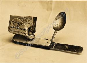 Penknife with spoon and matchbox holder.