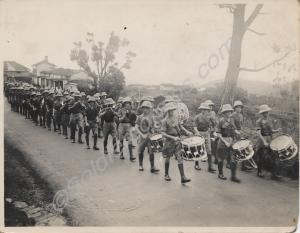 Band and marching troops. 1st Battalion, The Glouc