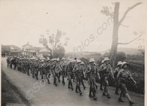Marching troops. 1st Battalion, The Gloucestershir