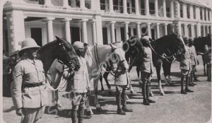 Horses being held by troops. Reverse 'A few of the