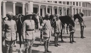Horses being held by troops. Reverse 'A few more C