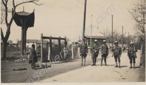 Road barrier with five soldiers. Reverse 'A Road B