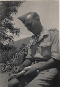 Soldier writing. Reverse 'Bougie N.A. 1943'. Tunis