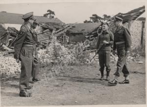 Group of officers. L to R Major Pullen of B Coy Co