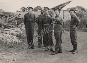 Group of officers. L to R Col. Hughes U.S. Army (S