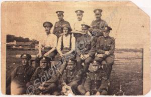 Group of soldiers. Reverse 'Headquarters Cricket T