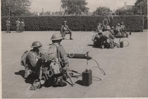 Machine gun platoon wearing gas masks.  2nd Battal