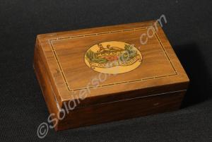 Wooden cigarette box with Sphinx badge and inlay.