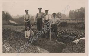 Digging a trench.  1/5th Battalion, The Gloucester