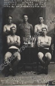 Four boxers and a trainer at the Army and Navy Box