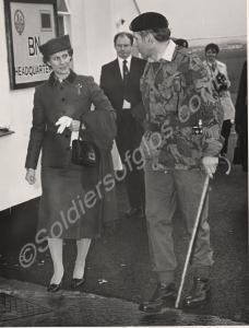 The Duchess of Gloucester accompanied by an office
