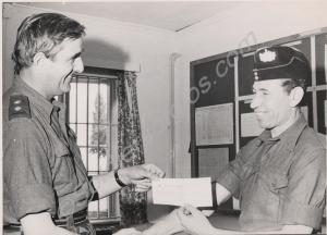 Presentation of cheque to Lance-Corporal Taylor in