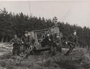 Exiting an armoured personnel carrier. 1st Battali