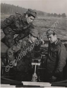 Three soldiers with mortar. 1st Battalion, The Glo