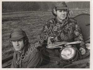 Map reading in armoured personnel carrier. The Glo