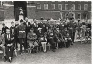 Veterans and dignitaries. Far right, Warrant Offic