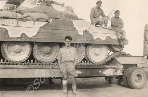 Crusader tank on transporter on way to Gambut.  Ro