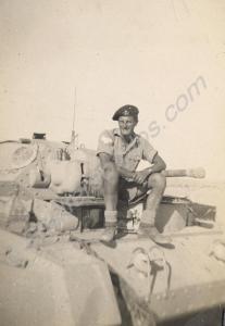 Roff Taylor Jones sitting on Crusader tank.  Royal