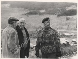 Soldier and two civilians. 1st Battalion, The Glou