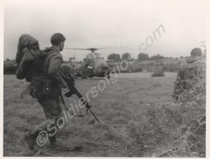 Soldiers with Wessex helicopter. 1st Battalion, Th