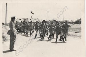 Lieutenant-Colonel Walwyn in Land Rover takes leav