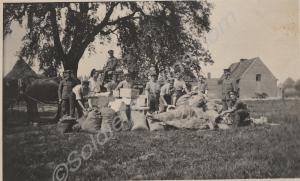Unloading food supplies from a wagon. Gloucestersh