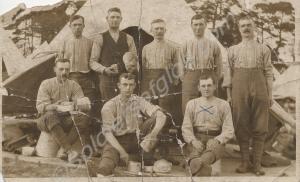Eight soldiers in camp. 13th Battalion, The Glouce