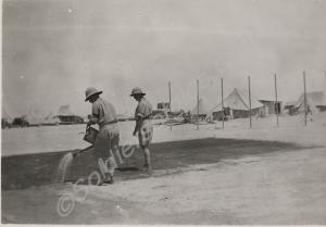 Watering the officers' tennis court.  2nd Battalio