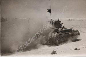 Vickers Light tank at speed.  Mersa Matruh, Egypt.