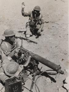 Desert exercise with gas masks and Vickers machine