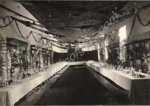A barrack scene,  possibly Christmas 1937. Tables