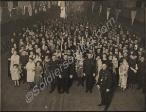 Officers, men and their families at a regimental p