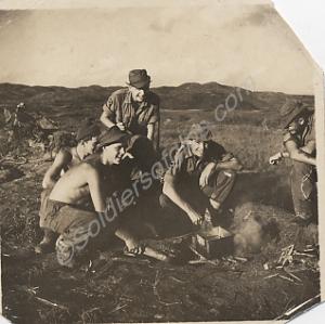 Soldiers cooking in the field.  1st Battalion, The