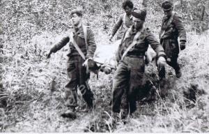 Stretcher party return with British casualty. 1st