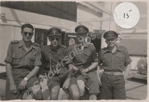 Group of officers on board ship. Joe Nicolson, "Du