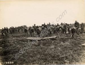 Working party of Canadian soldiers preparing the g