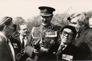 General Sir Michael Gow with veterans of the Glouc