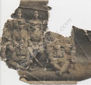 Very badly damaged photograph of group of officers