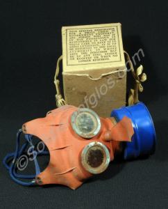 Child's "Mickey Mouse" gas mask with box. Issued t