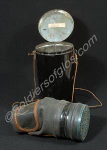 Second World War gas mask in tin cylinder carrier