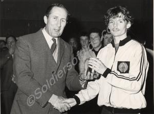 Lance-Corporal Wilson receiving his prize after wi