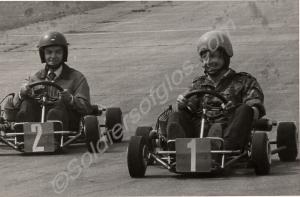 Lieutenant-Colonel Simon Firth and another driving