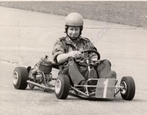 Lieutenant-Colonel Simon Firth driving a go-kart.