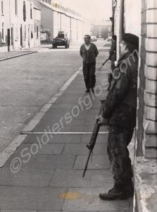 Private Davies (foreground). "D" Company on patrol